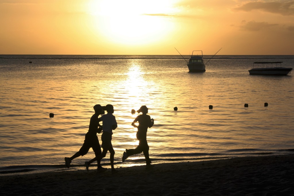 Jogger am Strand von Flic en Flac